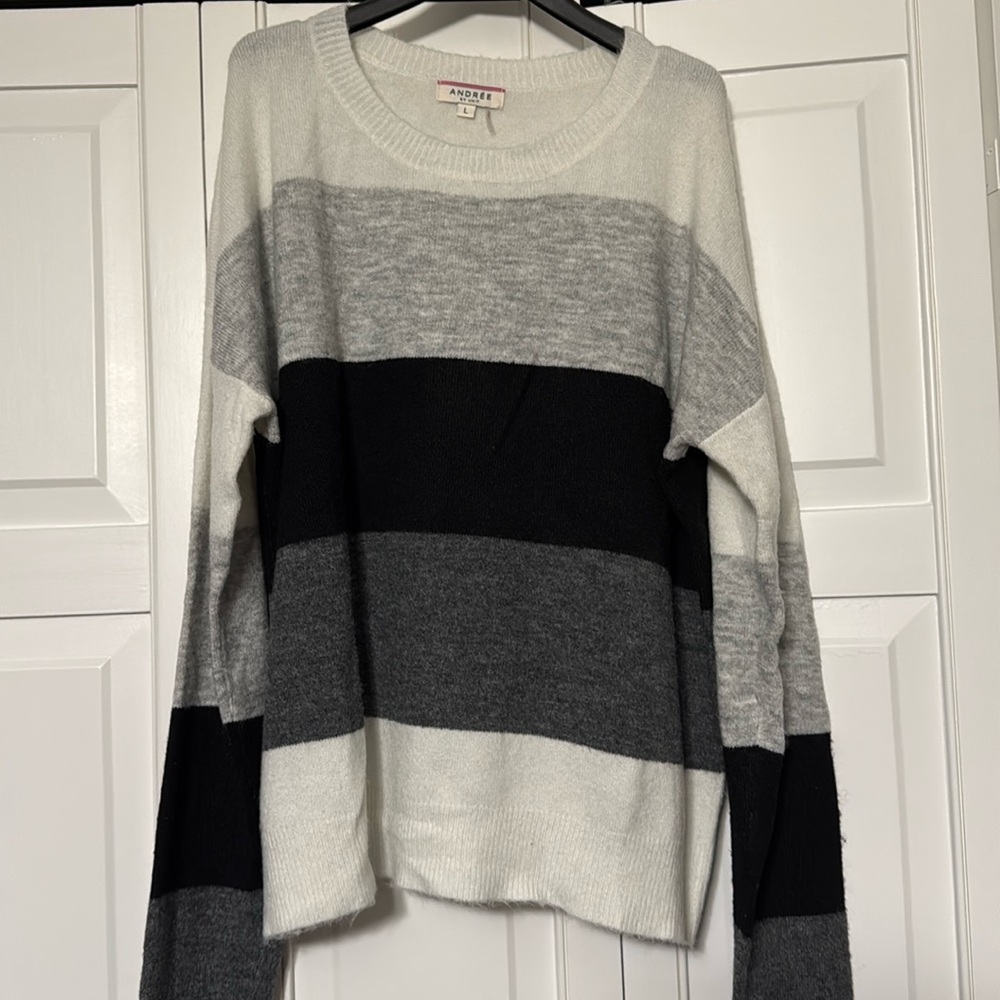 Women’s sweater by Andree. This is a size large.